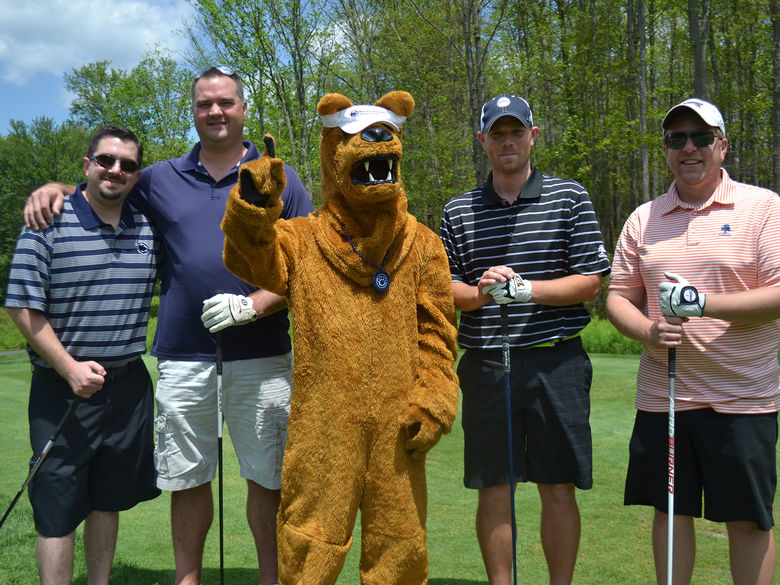 Group of golfers with Nittany Lion